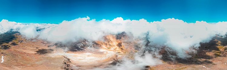 A panoramic view of the Dolomites and the countryside into Val di Fassa