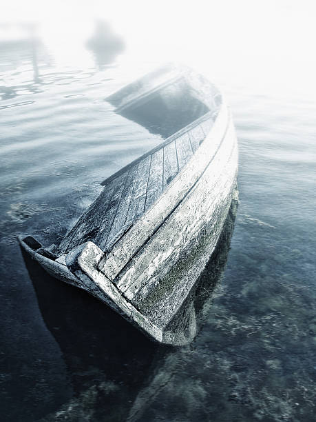 istock Sunken wooden boat 164409677