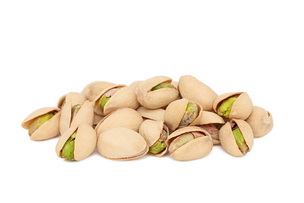 istock Pile of pistachios (isolated) 164414061