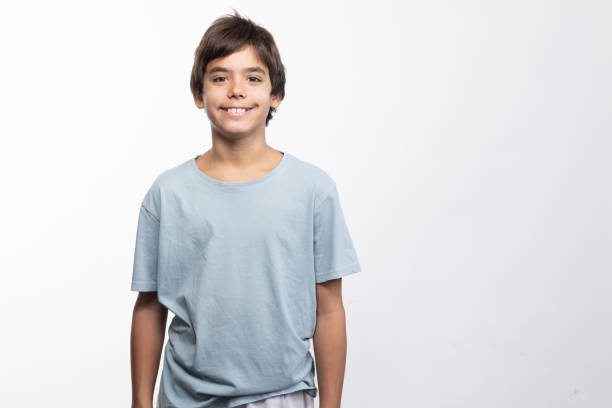 Studio portrait of the teenager wearing blue t shirt