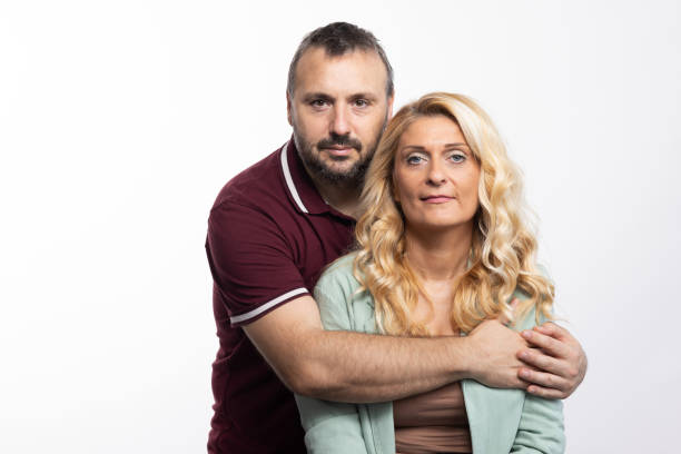 istock White heterosexual couple - studio shot on white background 1644144746