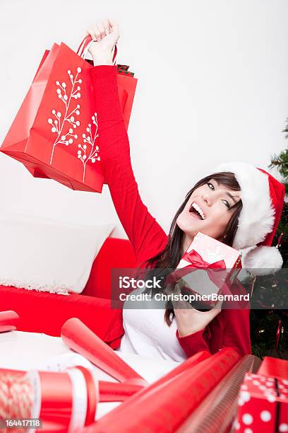 Christmas Gift Wrapping Stock Photo - Download Image Now - 18-19 Years, Adolescence, Arms Outstretched