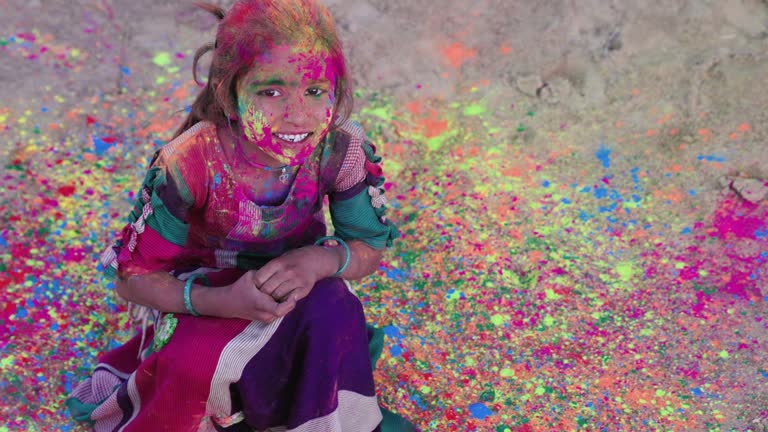 Colors of India - Indian children playing holi, desert village, India