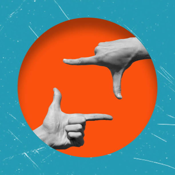istock Art Collage, Hands Shaped Like a Camera on an Orange Background. 1644175385