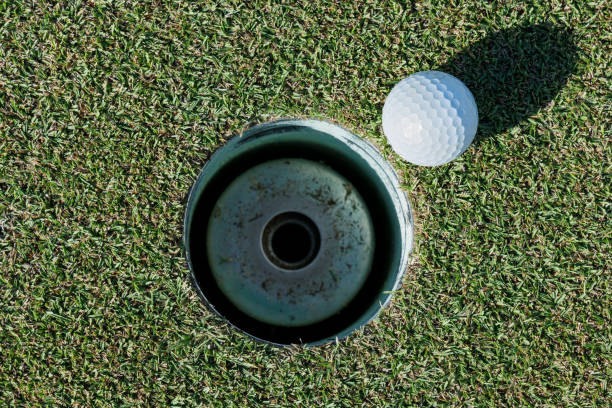 istock golf course green and golf ball 1644175399