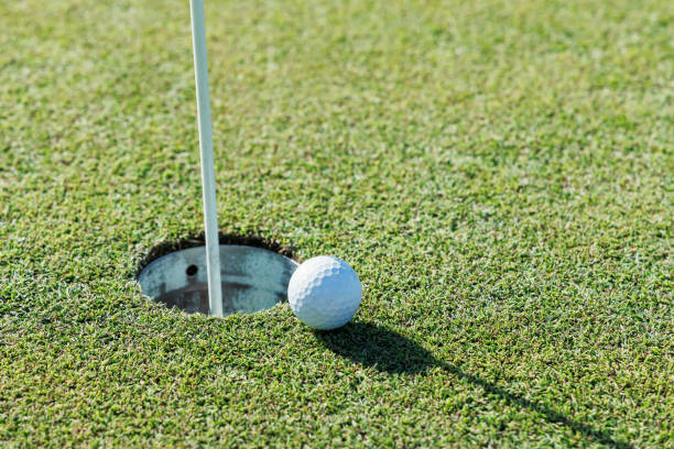 istock golf course green and golf ball 1644175942