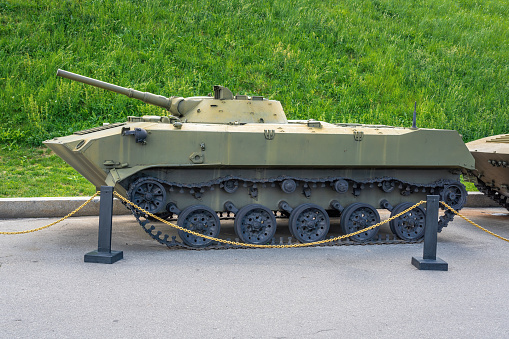 M1 Abrams tank, front-side view - main battle tank (unmarked, on static display outside Fort Carson Mountain Post, Colorado, USA)