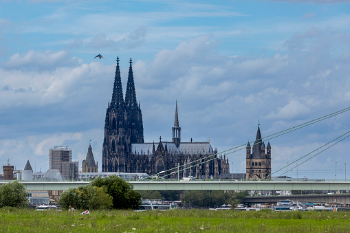 Cologne, Germany - Aug 13th 2023: Cologne cathedral is iconic and internationally known landmark in German city. It's twin towers are visible all over the city.