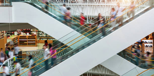 istock People on many fast moving escalators in modern shopping mall 1644193605