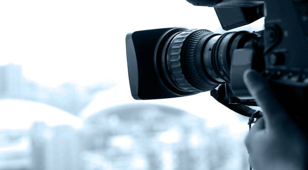istock Closeup of television operator with camera 1644194197