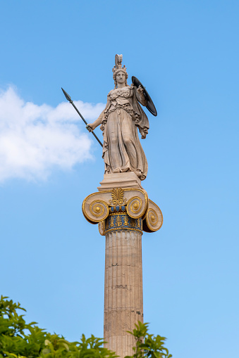 Athens, Greece April  27, 2023 Statue of the Goddess Athena in front of The Academy of Athens in Athens, Greece
