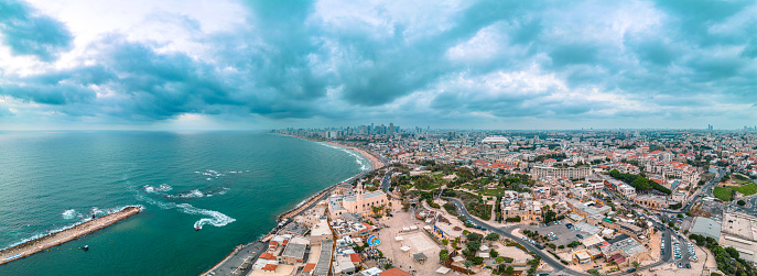 Aerial panoramic photo of the waterfront of Tel Aviv - Yafo  at afternoon and dusk in summer