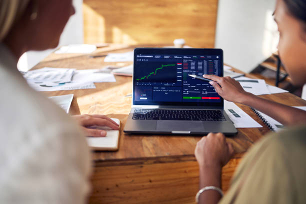 istock Computer screen, stock market and people hands in meeting, data analytics or statistics analysis of profit growth. Analyst women show client on laptop for trading. Investment app and finance fintech 1644238542