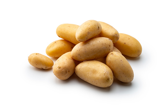 single cut out potatoes with white background