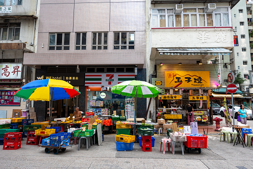 Hong Kong - August 28, 2023 : A fruit store in the Temple Street Market, Yau Ma Tei, Kowloon, Hong Kong.