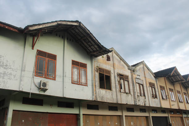 istock damaged and abandoned old shophouse building. 1644296573
