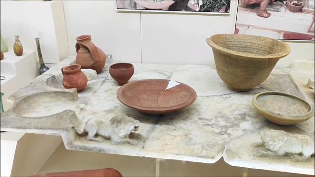 Old rare clay plates, jugs and dishes of primitive people found during excavations