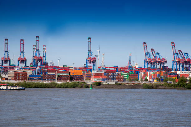View of the Southampton container port with cargo ships and cranes, showcasing global trade and logistics
