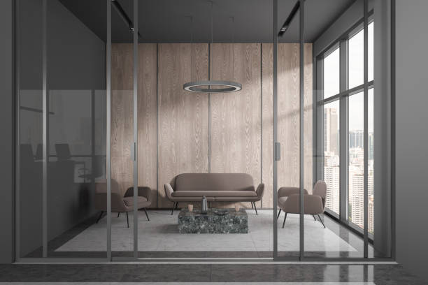istock Gray and wooden office waiting room interior with sofa 1644307851