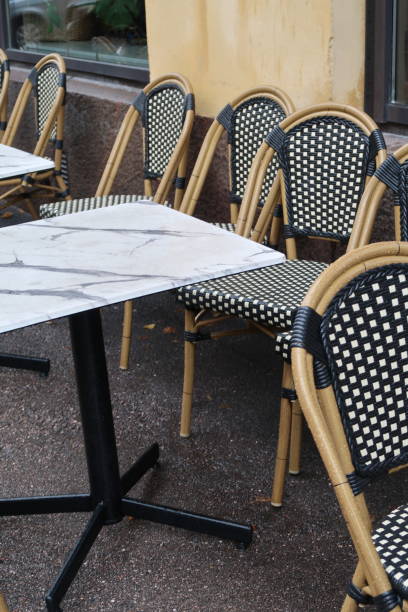 istock Restaurant Tables Outside on a Rainy Day in Helsinki, Finland 1644346099