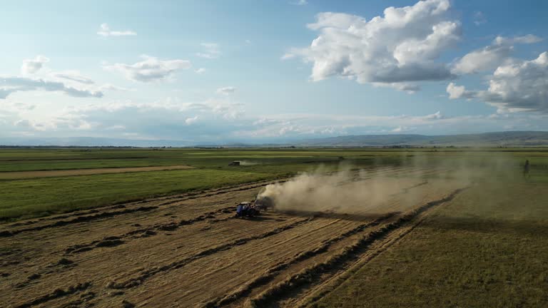 Farmer Square Baling Hay