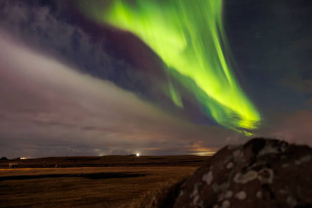 istock Northern lights snow covered mountains 1644360155