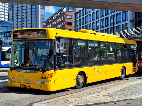 Yellow Scania Omnilink bus runned by EBS The Netherlands at Amsterdam Sloterdijk