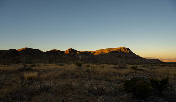 istock Dawn Breaks Over the Chisos Mountains from the Valley 1644374169