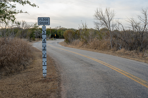 Flood Gauge Along Low Laying Road in Texas park