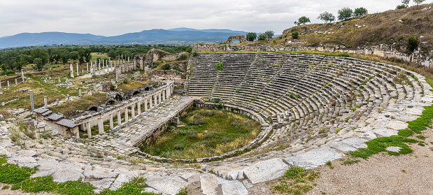 Athens, Attica / Greece - 2018/04/02: Panoramic view of Theatre of Dionysos Eleuthereus ancient Greek theater at slope of Acropolis hill