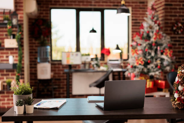 istock Laptop on desk at festive office 1644386788