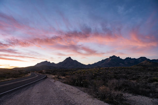 istock Light Pink Clouds Hang Over The Chisos Mountains At Sunrise 1644387385
