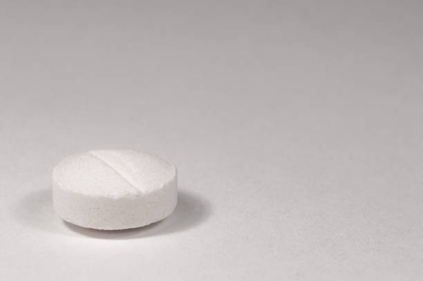 istock White medical pills and tablets with bottle 1644394219