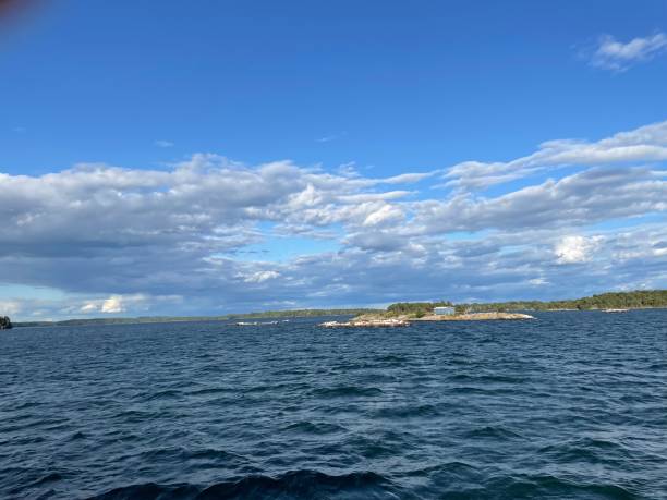 istock Clouds in the sky over ocean stock photo 1644394472
