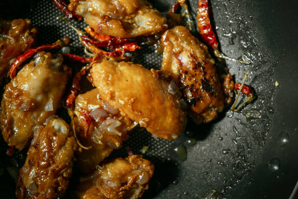 istock Chicken Fried with Tamarind Sauce ,Thai food 1644395377