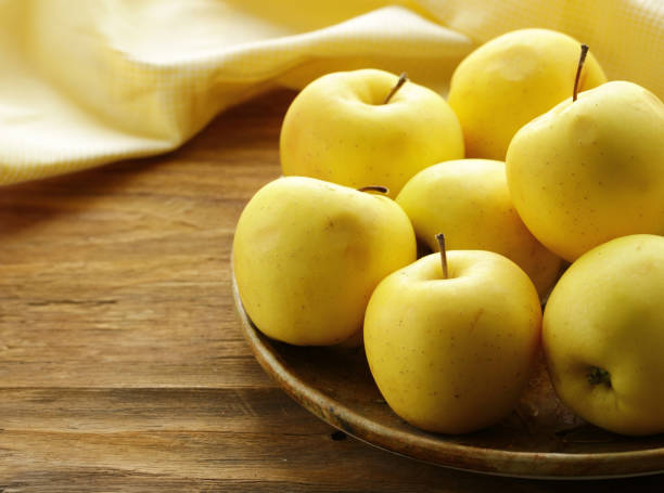 istock ripe organic apples on a plate on the table 1644397055