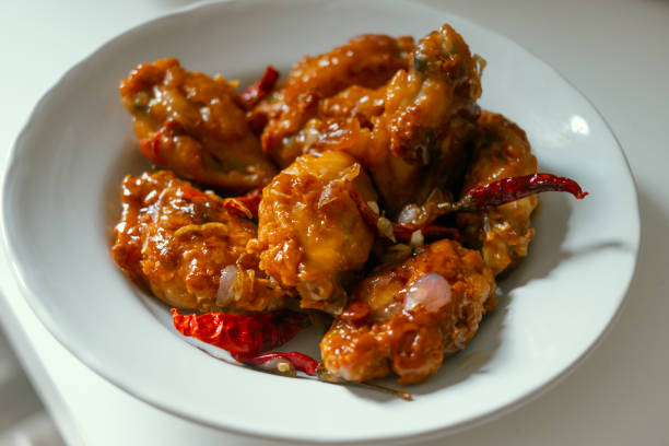 istock Chicken Fried with Tamarind Sauce ,Thai food 1644397089