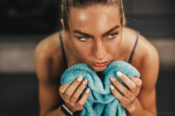 istock Woman Resting In Gym's Locker Room After Training 1644405490