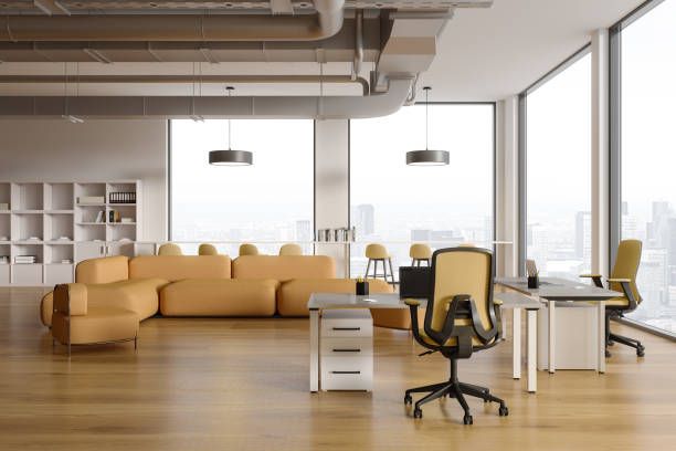 istock Cozy office lobby interior with workspace and relax place near window 1644413496