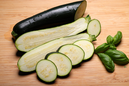 Freshly cut Zucchini on cutting board