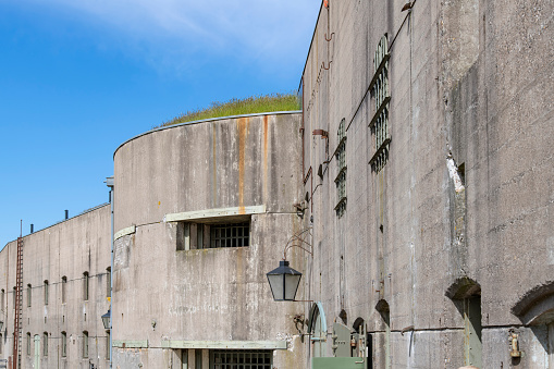 Westbeemster, The Netherlands-April 2022: View of concrete facade of Fort Spijkerboor, the most important fort in the defence line (or stelling) of Amsterdam now UNESCO World Heritage site