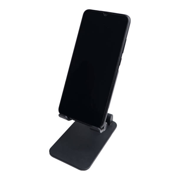 istock Smartphone on stand holder isolated on white background 1644445784