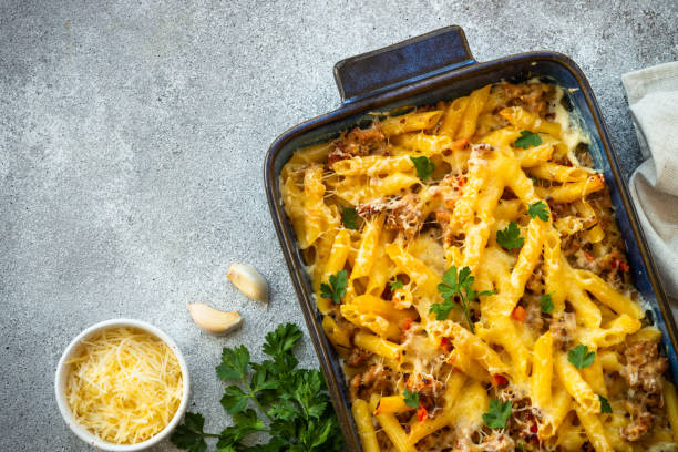 istock Pasta penne with minced meat, cheese and creamy sauce. 1644466035