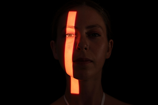 Light line on woman's face.
