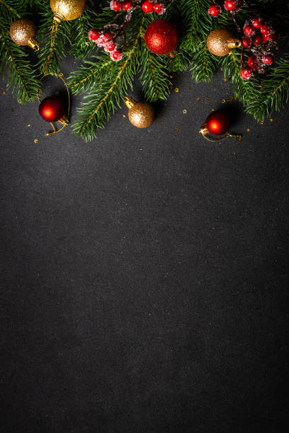 istock Christmas flat lay background with holiday decorations on black. 1644468492