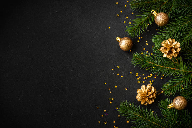 istock Christmas flat lay background with holiday decorations on black. 1644468691
