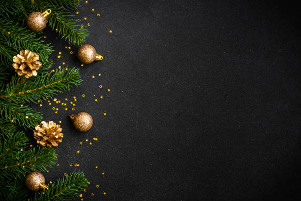 istock Christmas flat lay background with holiday decorations on black. 1644468702