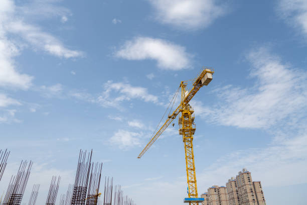istock Hoisting of buildings under construction 1644469260