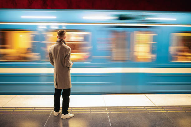 Cтоковое фото Молодой человек на станции метро