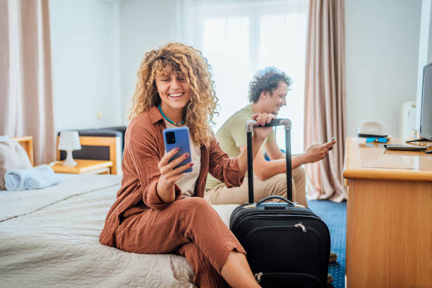 istock Young couple in the hotel room 1644486691